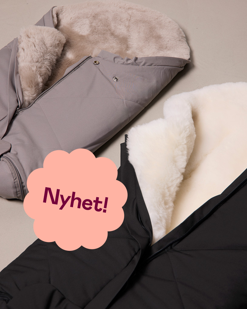 Två Nordlys vinteråkpåsar i beige och svart med mjukt foder. Text: ”Nyhet!”.