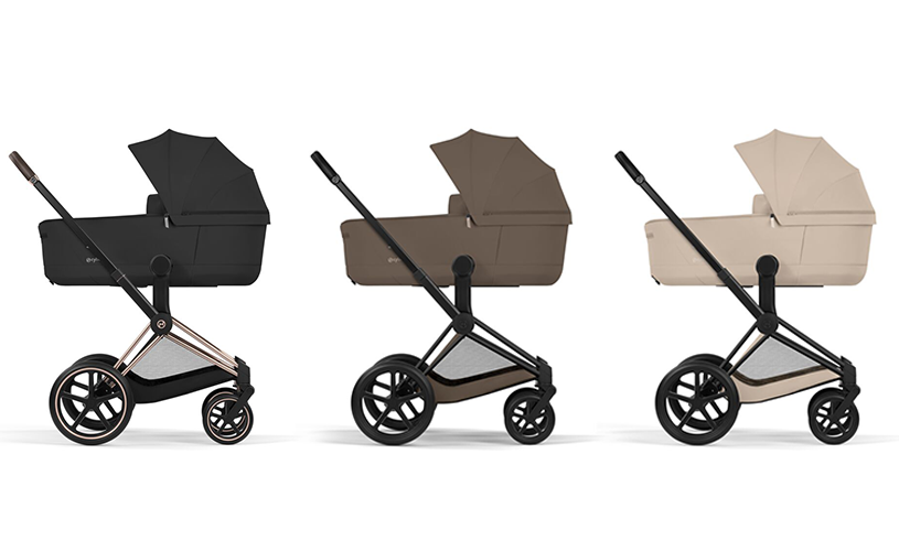 Tre Cybex-barnvagnar i svart, brunt och beige med eleganta chassin i roséguld och svart på vit bakgrund.